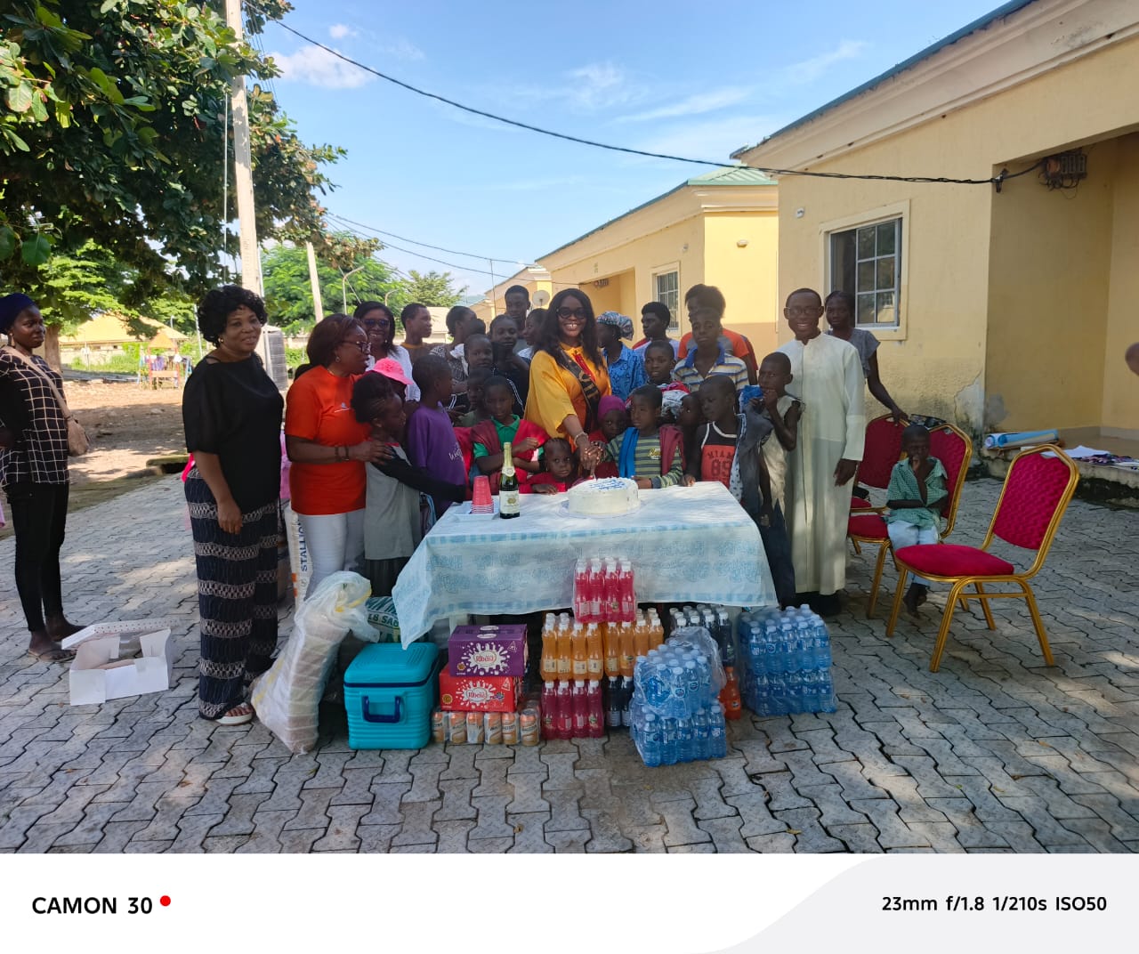 Children celebrating at a community children's home outreach