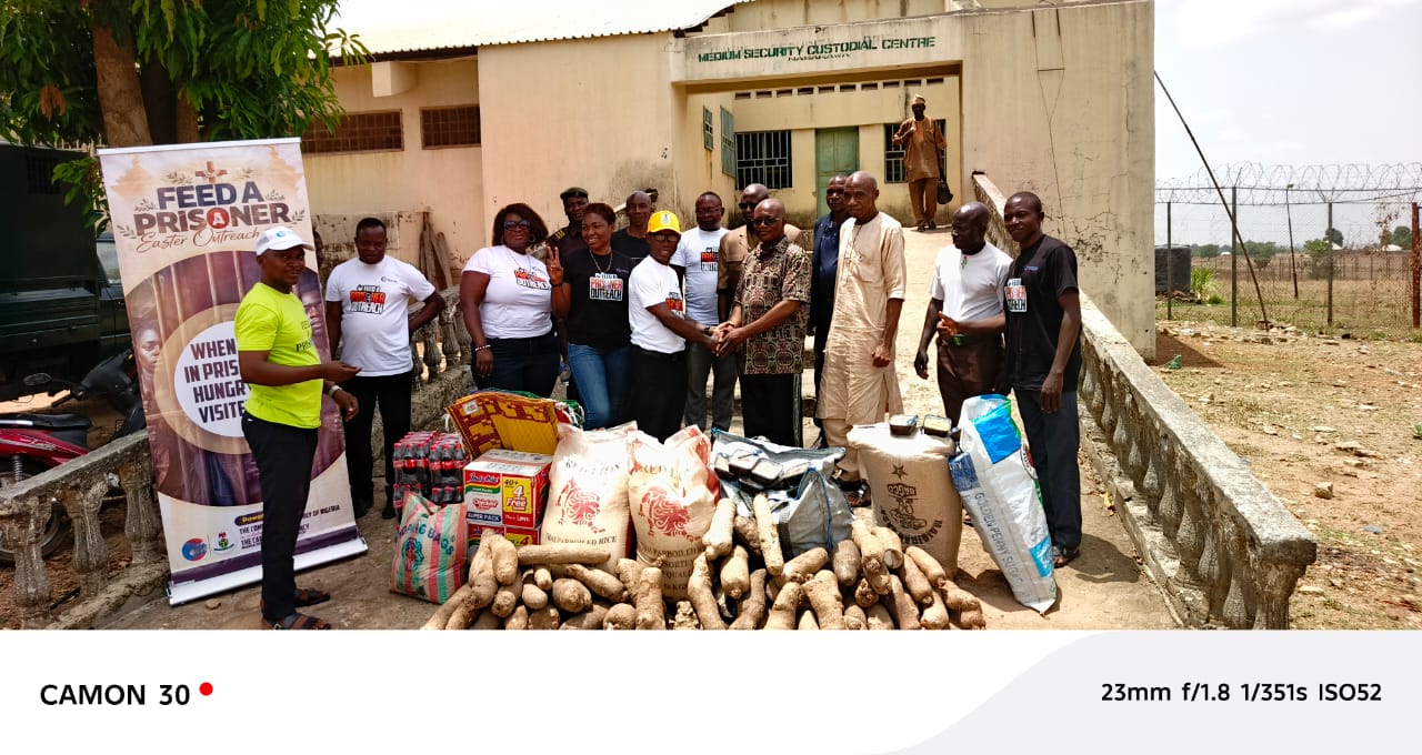 VIN-JPIC volunteers presenting food and provisions during the Feed a Prisoner Easter outreach at a custodial centre